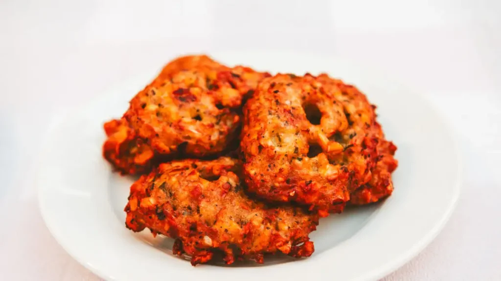 Pitaroudia. Savory fritters traditionally made from chickpeas or potatoes, with a blend of aromatic herbs and vegetables.